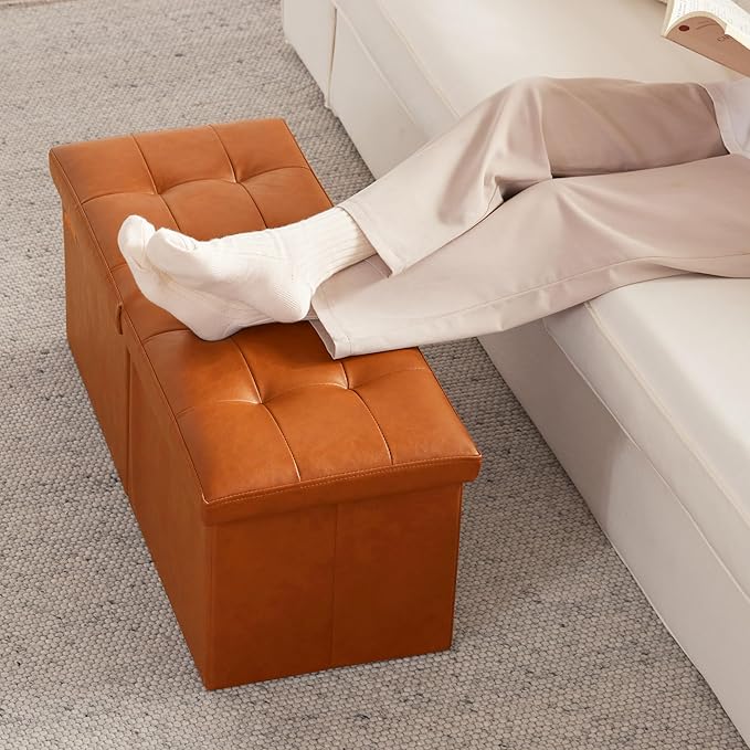 HAUSFRAU 31.5 Inches Ottoman with Storage Bench, Folding Ottoman Bench Small Foot Rest Stool, Bedroom Bench with Flipping Lid, Faux Leather Cognac Brown