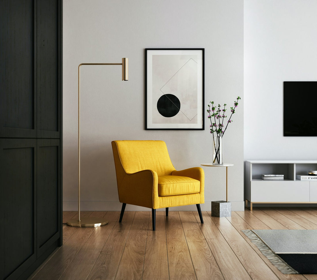 Clean minimalist interior with carefully curated furniture, art, and accessories creating a calm and intentional living space