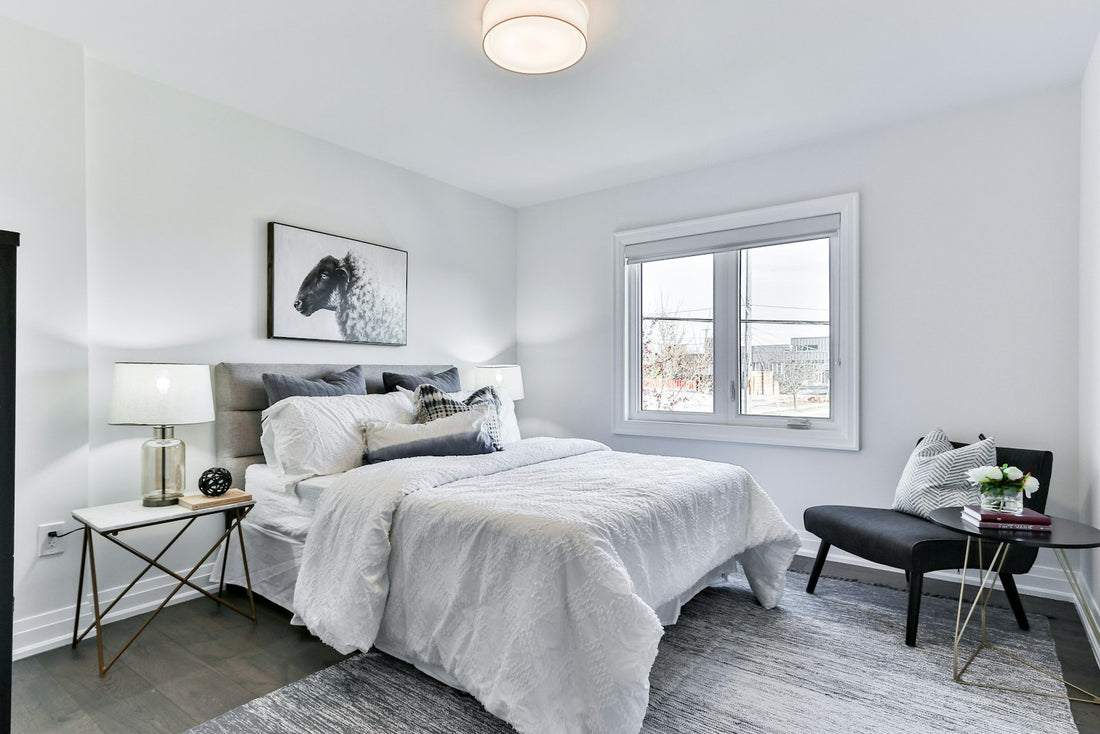 Warmly and cohesively decorated home interior with seasonal holiday elements, greenery, candles, and natural materials creating a festive atmosphere