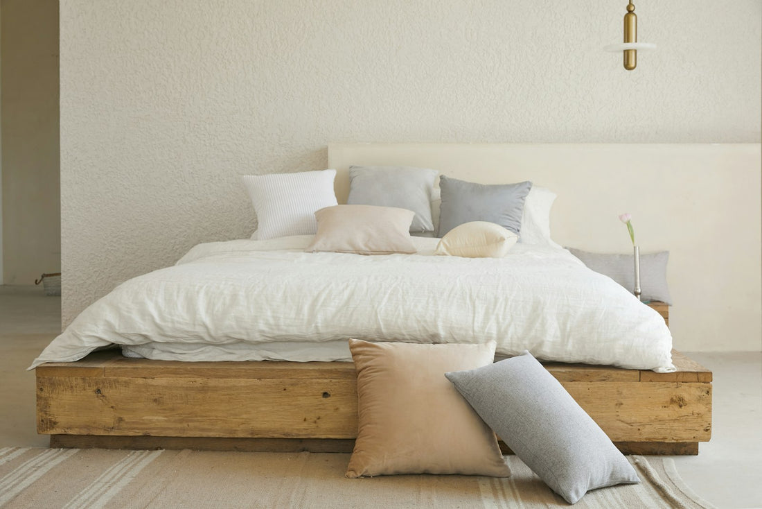 Beautifully designed studio apartment with clearly defined living, sleeping, and working zones created without physical walls