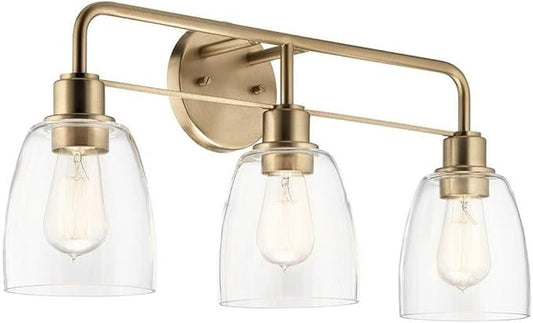Kichler Meller 24.25 Inch 3 Light Vanity Light with Clear Glass Shades in Champagne Bronze for Bathroom or Powder Room, (24.25" W x 11.25" H x 7" D) 55102CPZ