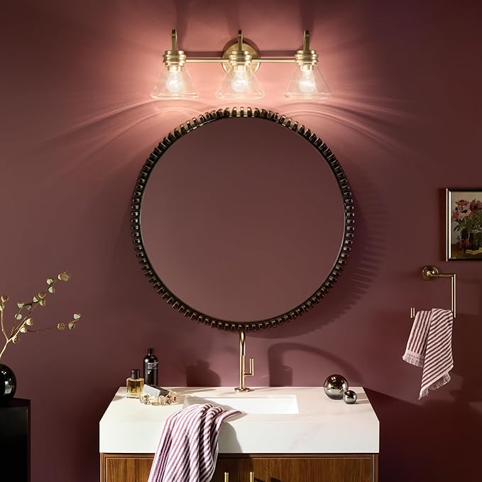 Kichler Farum 26" 3-Light Vanity Light with Clear Glass in Champagne Bronze, for Single or Double Vanity, Over a Mirror, Powder Room, Bathroom, (26" W x 9.5" H) 55155CPZCLR