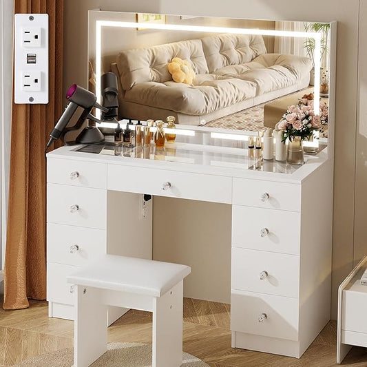 VOWNER Vanity with Lighted Mirror - 47" Glass Top Makeup Vanity Desk with 9 Drawers and Power Outlet, 3 Color Lighting Modes Adjustable Brightness, Makeup Desk with Cushioned Stool for Bedroom, White