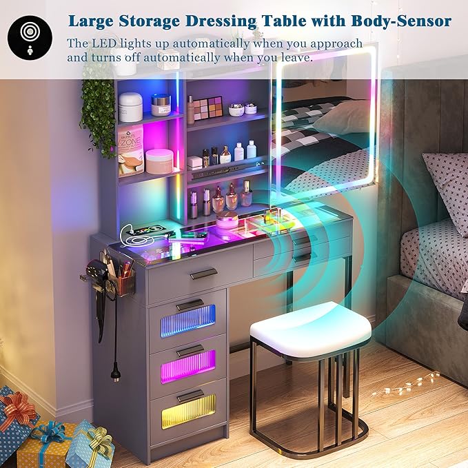 RGB Vanity Desk with Sliding Mirror and Lights, LED Makeup Vanity with Charging Station/Motion Sensor Light, Glass Top Dressing Table Set with Jewelry Box,6 Drawers,Stool for Bedroom(Grey)