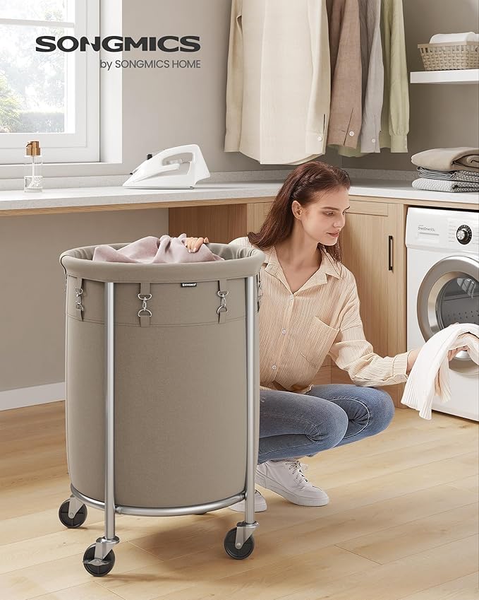 SONGMICS 29-Gallon (110 L) Laundry Basket with Wheels, Rolling Round Heavy-Duty Laundry Hamper Cart with Steel Frame and Removable Bag, 2 Locking Wheels, Camel Brown and Metallic Silver URLS002N01