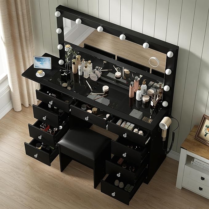 Vanity Desk & Power Outle, Makeup Vanity with Mirror and 12 LED Lights, 9 Drawers Makeup Table with Fold-up Panel, 3 Lighting Modes Brightness Adjustable (Black)