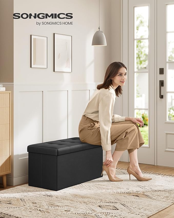 SONGMICS MAZIE Collection-30 Inches Folding Bench Ottoman with Storage, Foot Rest Stool, Load 660 lb, for Living Room, Synthetic Leather, Black ULSF105, 15" D x 30" W x 15" H