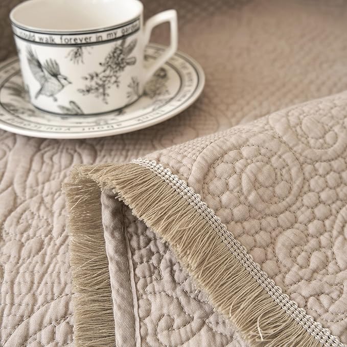 DaDa Bedding Elegant Fringed Cotton Quilted Throw Blanket - Luxurious Solid Soft Paisley Pattern, Cozy Lightweight Lap Throw, Perfect for Couch or Bed, Neutral Sandy Taupe Tan Beige, 50x60 Inches