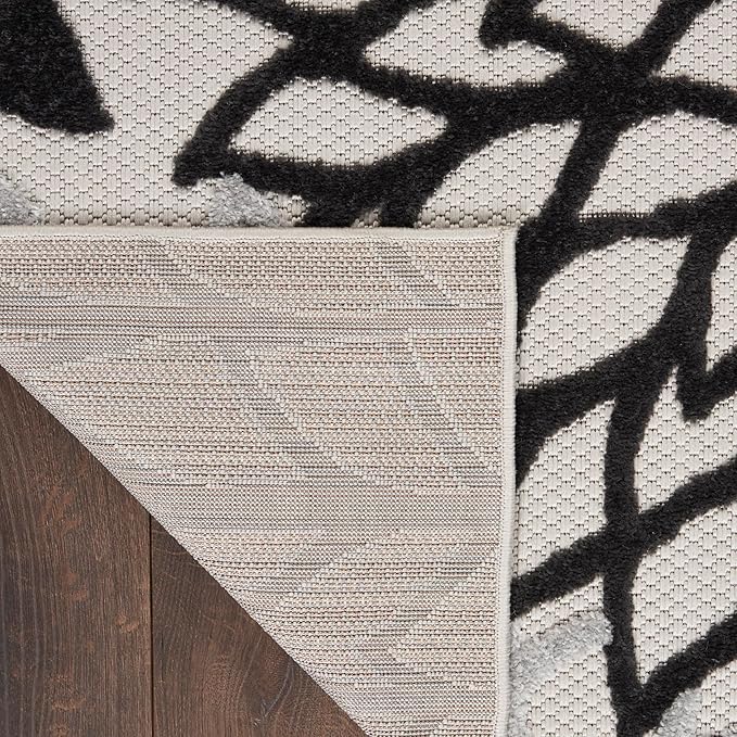 Nourison Home Aloha 114" x 156" Fabric Indoor/Outdoor Rug in Black/White Finish