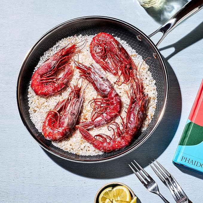 HexClad Hybrid Nonstick 12-Inch Frying Pan with Tempered Glass Lid, Stay-Cool Handle, Dishwasher-Friendly, Oven-Safe Up to 900°F, Induction Ready, Compatible with All Cooktops